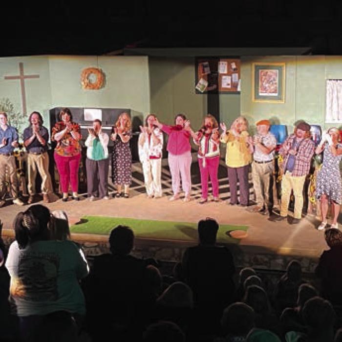 The entire cast of the show comes out on stage to applause at the conclusion of Saturday night’s performance.
