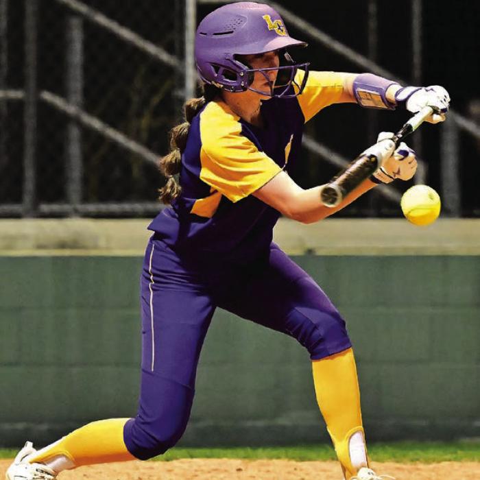 Freshman Kyndal Brawley lays down a bunt. Photo by Stephanie Steinhauser