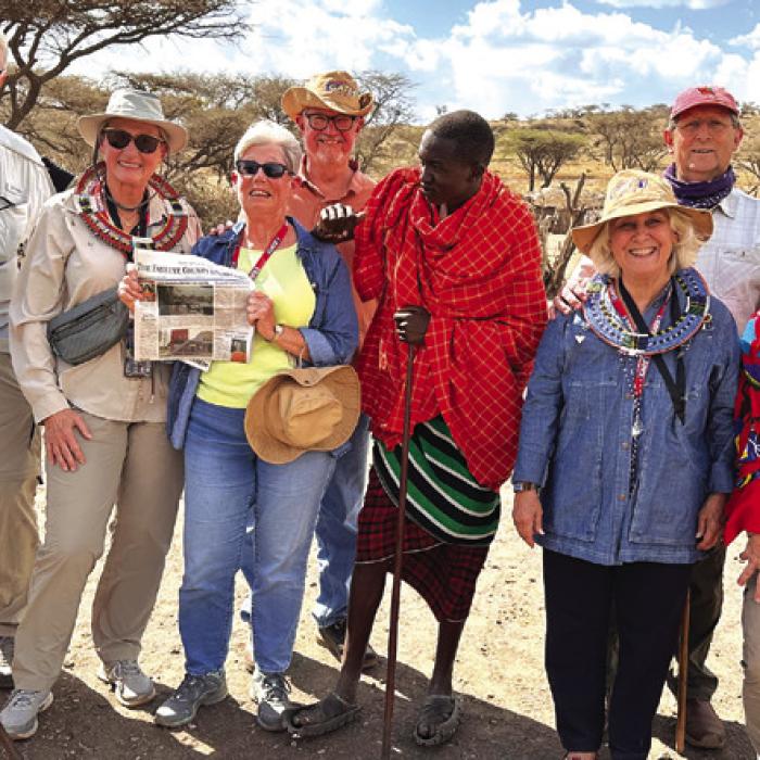 Bette and Jerry Gips of Fayetteville (Bette is holding the paper), Deborah and Ken Ripper, Austin County residents Julie and Maury Shepherd, Cecilia Samish and Dorothy Morrison recently returned from Tanzania in East Africa.