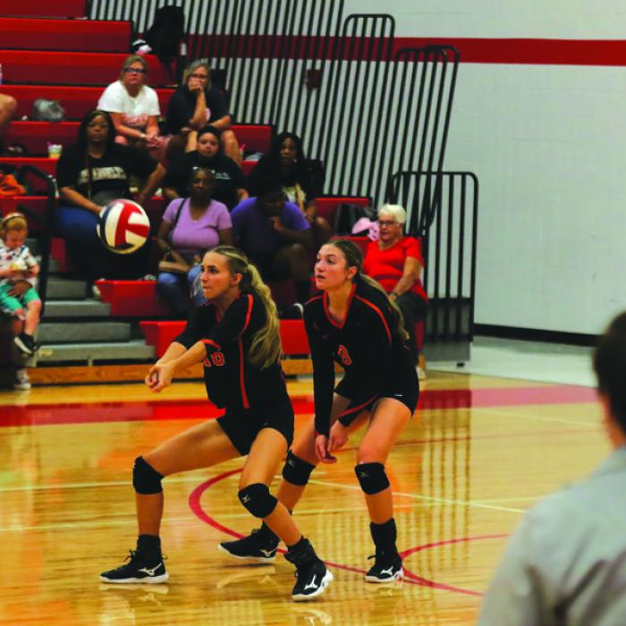 Schulenburg’s Jenna Guentert digs a ball in action at the Columbus Tournament last week. Photo by Audrey Kristynik