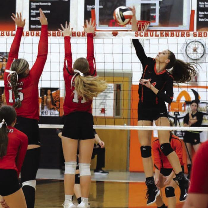 Schulenburg’s Emmrie Marx spikes a ball in Friday’s victory over Brazos. Photo by Audrey Kristynik