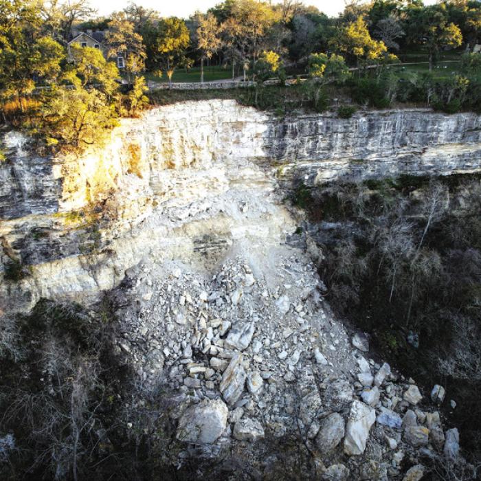 Mike Speck shared this drone photo of the aftermath of the bluff landslide, which occurred on Nov, 24. This shot shows just how close the landslide was to the Kreische House (near arrow).