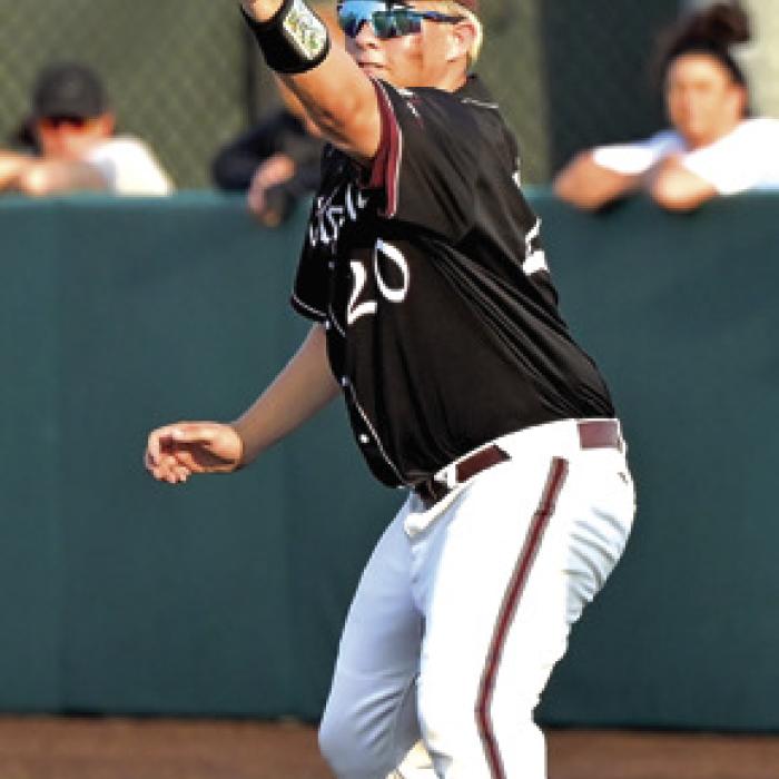 Railey Nieto catches the ball for the final out of the game on first base. Photo by Stephanie Steinhauser