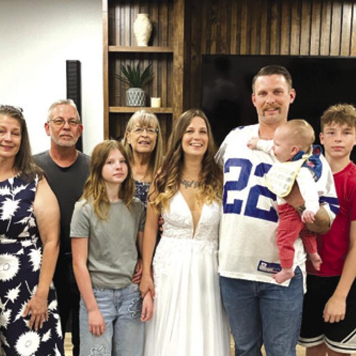 The wedding party for Valarie Schick and Justin Simpson. Angela Summers (Justin’s mom) children: Mackenzie, Mason, Madison, and Luke; Heather Schick (Val’s mom) and Nancie Blair.