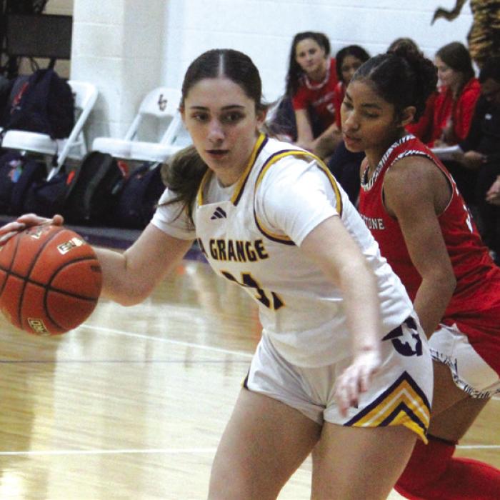 From left to right, La Grange’s Mylah Blaschke, Campbell Cooper and Faith Greenwood in action in Friday’s game against San Antonio Cornerstone Christian. Photos by Jeff Wick