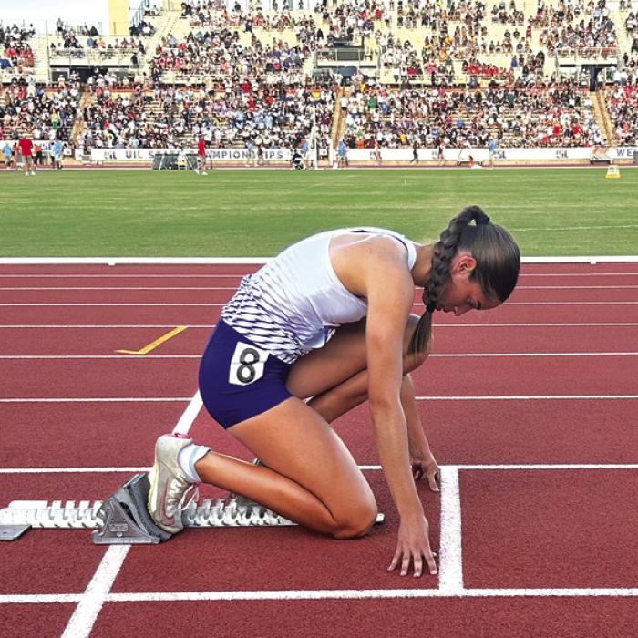 La Grange’s Macie Collier in the starting blocks for the 300 hurdles with thousands watching Thursday at UT. * Collier’s medal winning performance at state was one of the best for an LHS girl since Charline Grant won the 1981 3A 100 meter hurdle title and the 1982 3A long jump title for the Lady Leps.