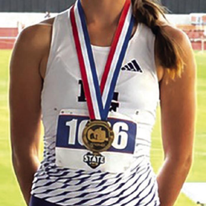 La Grange’s Macie Collier with her state bronze medal Thursday in Austin.