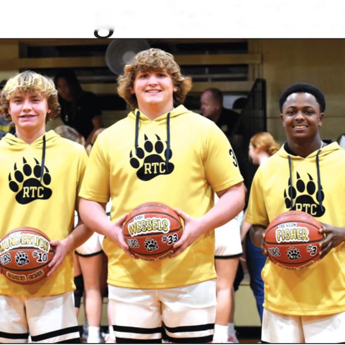 Photo by Paul Kipp The Round Top-Carmine boys basketball team held senior night activities for the team’s three seniors last Tuesday. They are shown here, left to right: Cody Wunderlich, Kash Wessels and Tre Fischer.