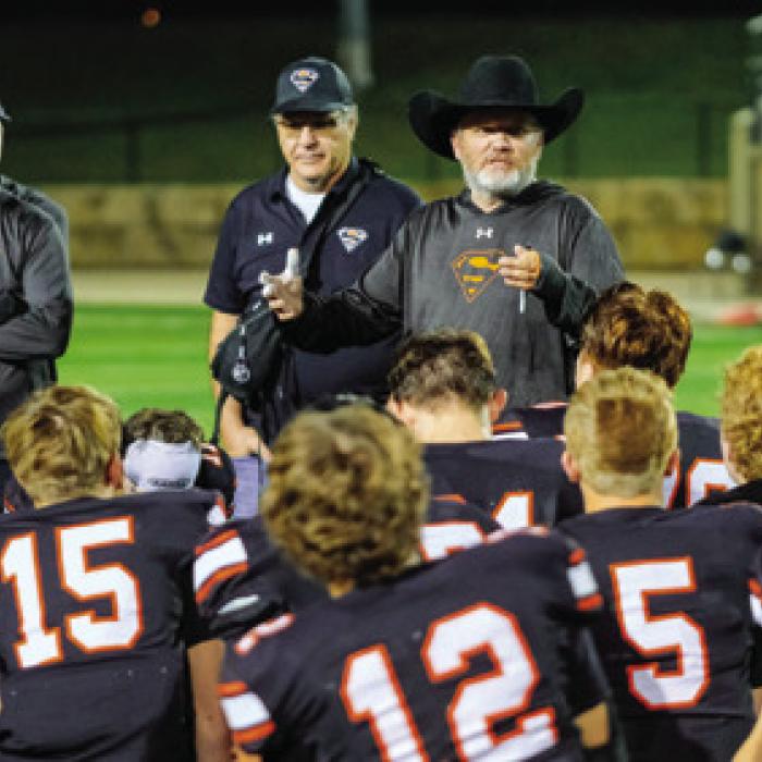 Schulenburg head coach Clay Ferguson speaks to his team after their season-ending loss to Mason in the second round.