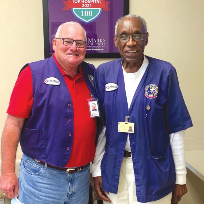 St. Mark’s Medical Center Purple Angel emergency department volunteers, (from left) Robb Muil and Felton Greer.