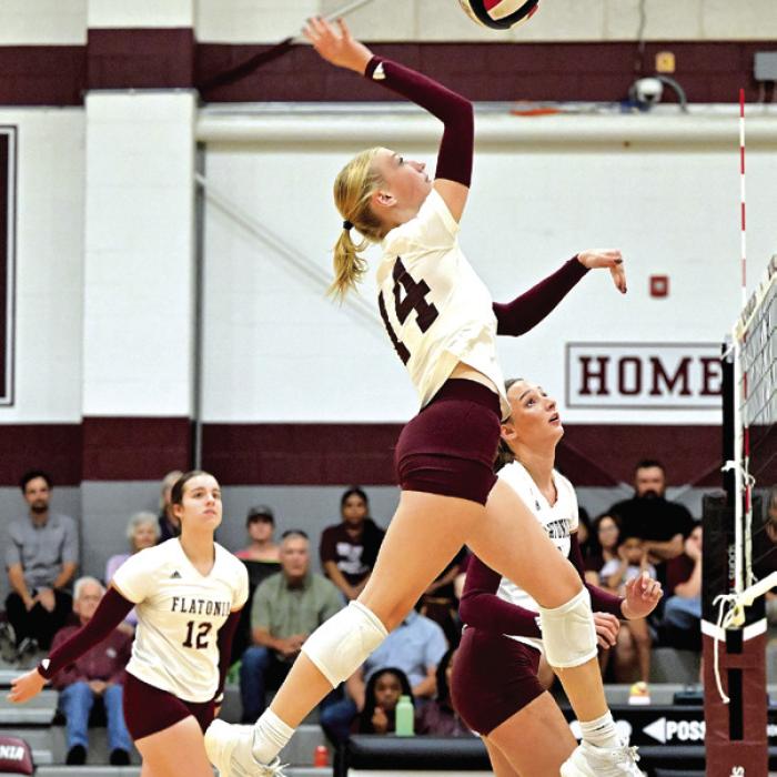 Quinn Arnett goes up for a kill for Flatonia in the final set of Tuesday night’s five set game with Gonzales. Photo by Stephanie Steinhauser