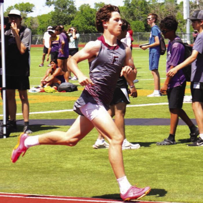 Fayetteville’s Mason Fenhaus won the area title in the 800 meters. Photo by Ann Pape