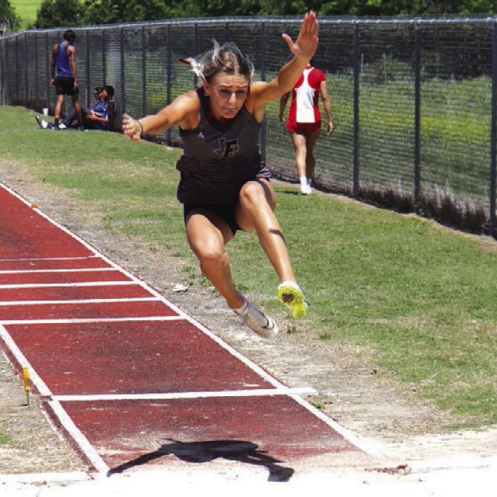 Fayetteville’s Aubree Graeter was first in the triple jump and fourth in the long jump. Photo by Ann Pape