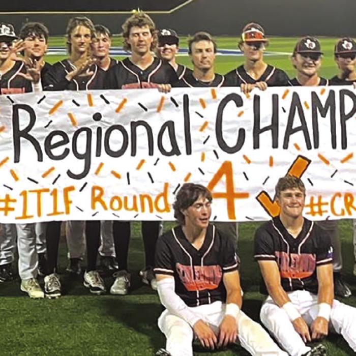 The members of the Schulenburg baseball team pose after Saturday’s win to clinch the regional title.