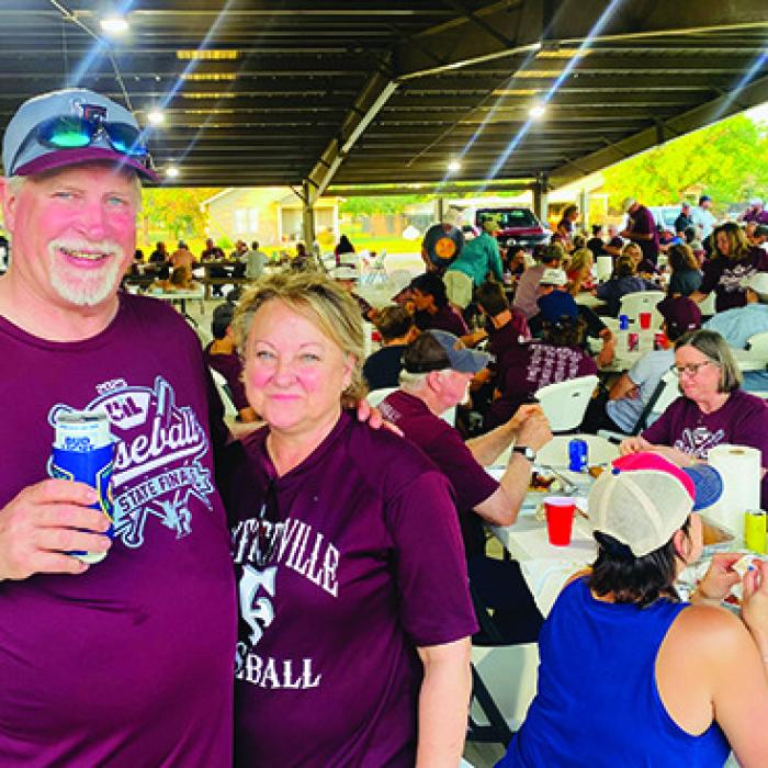 Joe and Lisa Simpson (pictured above) gifted the State Championship Winning Fayetteville Lions team and their family a party truly fit for a Lion King. The Ellinger Chamber of Commerce provided their pavilion while Joe and Lisa Simpson provided enough crawfish to fill everyone’s belly. Local business owner and Lions supporter Terri McPherson supplied the championship cake (pictured below with the Fayetteville Lions Baseball Team). It was a huge turnout for a very successful and proud team.