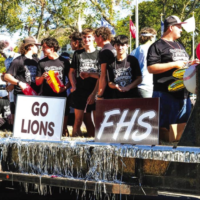 The members of the Fayettevile High School State Championship Baseball Team were the parade marshals at the Lickskillet Parade Sunday. Photo by Andy Behlen