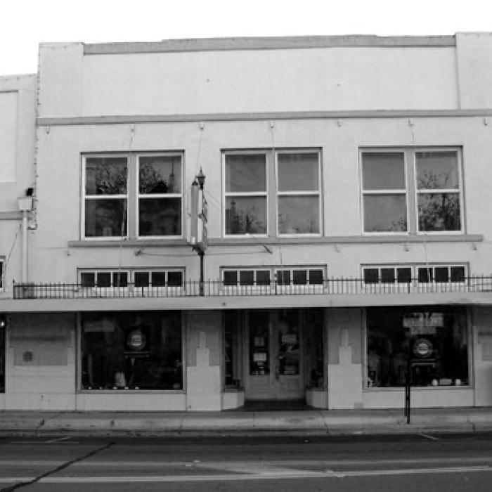 This 2010 photograph by Kathy Carter shows the three buildings on Travis Street that once made up the Von Rosenberg Company. Photo courtesy of the Fayette Heritage Museum &amp; Archives