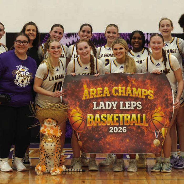 The members of the La Grange girls basketball team celebrate their Area round victory Thursday in Thrall. Photo courtesy of Amber Trlicek