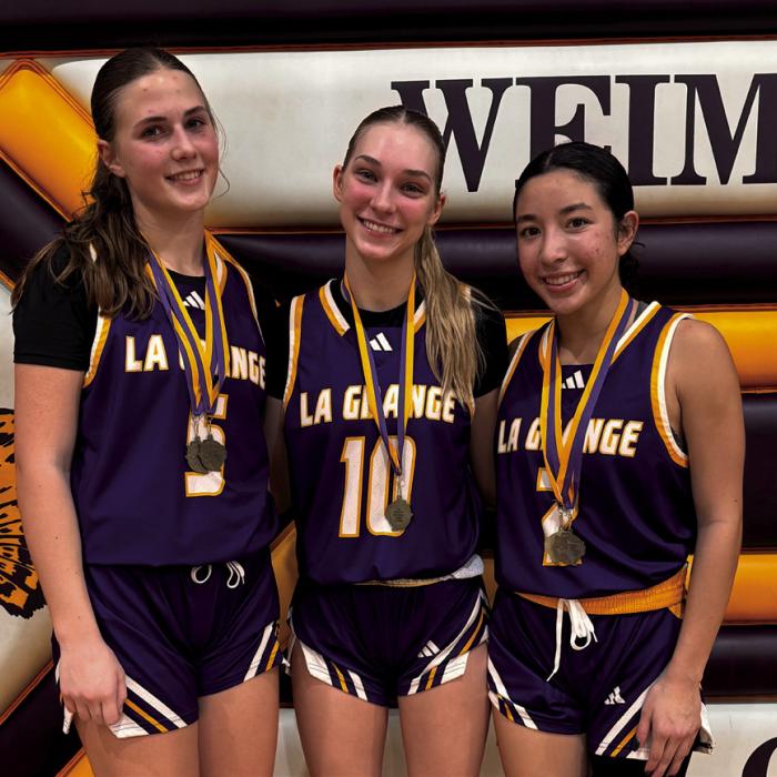Kylie Trlicek (center) was named MVP of the Weimar Tournament. Campbell Cooper (left) and Landri Hernandez (right) were named to the All-Tournament team.