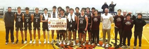The Fayetteville basketball team poses after Friday’s victory.