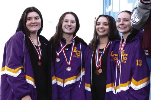 La Grange Girls 400 relay team at district, left to right: Madeline Willrich Eleanor Carey, Celeine Fabre, Adysen Janacek.
