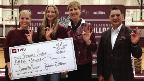 From left to right: Texas Woman’s University Basketball Head Coach Beth Jillson, Flatonia HS senior Summer Sodek, TWU Chancellor Carine Feyten, and TWU VP for Enrollment Management Javier Flores.