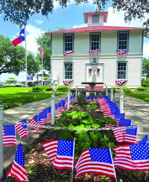 The Round Top courthouse grounds are all decked out in red, white and blue for Memorial Day weekend. Photo by Jeff Wick