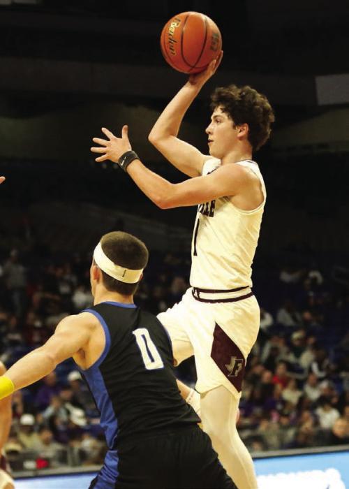 Mason Fenhaus drives the lane to score a jumper in the fourth quarter. Fenhaus led the Lions in scoring with 18 points. Photo by Ken Sury