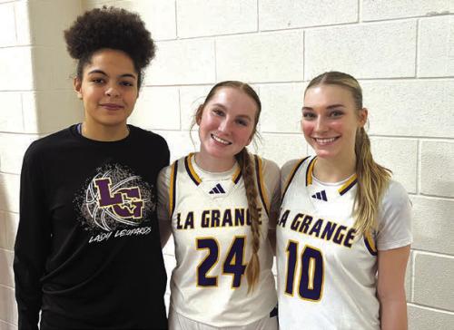 The seniors on the district championship La Grange girls basketball team, left to right, manager LaDonije Lewis, and starters Ella Nygren and Kylie Trlicek. Photo by Jeff Wick