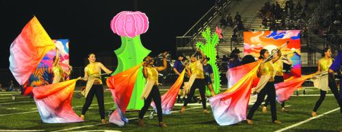The La Grange High School band will show off their stunning marching show “Sonoran Sketches” complete with large cactus cutouts and sunset banners this Friday during halftime of the football game. Photo by Jeff Wick