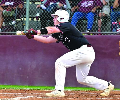 Henri Vincik lays down a bunt for Flatonia in Tuesday night’s district win over Ganado. Photo By Stephanie Steinhauser