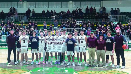The Fayetteville Lions pose after their win Monday in the state semifinals. Photo by Jeff Wick