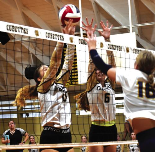 Round Top-Carmine’s Rebekah Sacks and Caydan Nelius jump to block this shot in Friday’s match. Photo by Paul Kipp