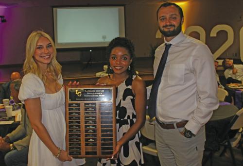 The La Grange High School Female Fighting Heart Award winners presented at last Monday’s Sports Banquet were, left, Kylie Trlicek and center, Diamond McKenzie, presented by head coach Ryan O’Neal. Reprinting to correct a mistake from Friday’s Edition