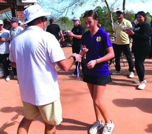 La Grange’s Briella Veitch receiving her 1st Place medal.