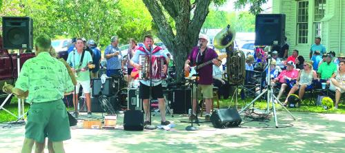 St. John the Baptist Catholic Church in Ammannsville celebrated its 134th Annual Church Feast on Sunday, June 16. Pictured above are Mark Halata and Texavia performing under the pecan trees.