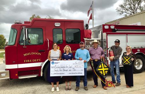 LCRA representatives present a $25,000 grant to the Muldoon Volunteer Fire Department for a new brush truck and rescue equipment. The grant is part of LCRA’s Community Grants program. Pictured, from left to right, are: Melissa K. Blanding and Margaret D. “Meg” Voelter, LCRA Board members; Stephen Kelly, president and fire chief; Craig Moreau, public information officer and firefighter; Herbert Hart, firefighter; and Kate Ramzinski, LCRA Regional Affairs representative.