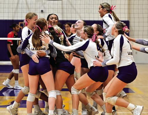 The Lady Leps celebrate after the final point of Tuesday’s victory over Smithville. Photo by Stephanie Steinhauser
