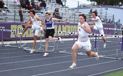 La Grange’s Clayton Cooper, shown here in the foreground at the recent La Grange Relays, won the 300 hurdles at the Columbus Meet. Photo by Jeff Wick
