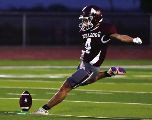Flatonia’s Jose Maria Garcia, kicks off in the season opener. He nailed three-extra points against Sacred Heart Friday. Photo by Stephanie Steinhauser