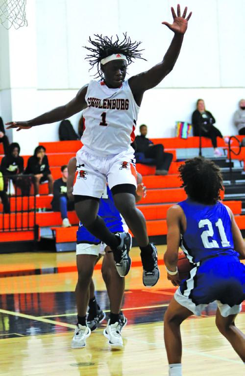 Schulenburg’s Rodney Walton leaps to block this shot attempt in action at their home tourney last weekend. Photo by Audrey Kristynik