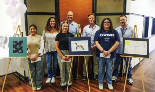 The owners of the St. Mark’s Medical Office Building held an art contest for La Grange High School students. The winning art will be on display inside the building. Pictured are (front, from left) first place winner Camila Vega, second place winner Kyla Colon, third place winner Natalie Rios, (back) building owners Marian Mason, Paul Mason and Guy Brazell, and La Grange High School art teacher Jack Vollbaum. Photo by Andy Behlen
