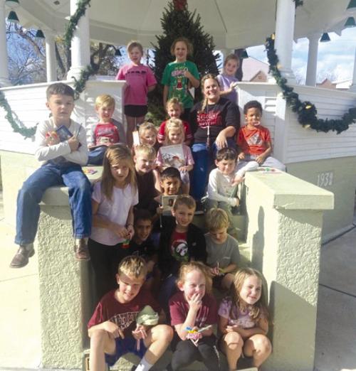 Fayetteville ISD first graders enjoyed the Christmas Tree Display and all the decorations on the square.