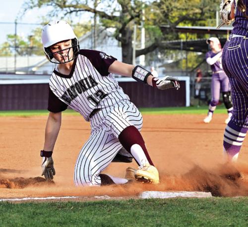 Presley Cliffe slides into third on a triple hit to centerfield Friday night in a district matchup with Shiner. Cliffe knocked in Jalee Trussell to put a run on the board in the first inning. The Flatonia girls lost 18-4.