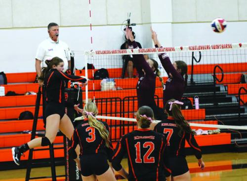 Schulenburg’s Halee Vacek spikes a ball in Tuesday’s victory over Ganado.
