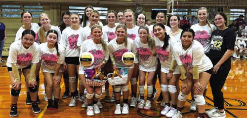 The members of the Round Top-Carmine volleyball team celebrated their district title last week after beating Fayetteville in the season finale. The Cubettes also honored their two seniors that night, twins Tess and Jill Eilers, shown front and center, holding the volleyballs.