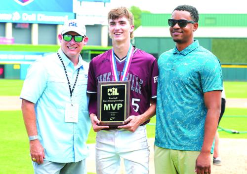 Fayetteville’s Easton Jaeger, center, was presented the championship game MVP trophy at the conclusion of Saturday’s game, by a pair of UIL officials. Photo by Scott Coleman