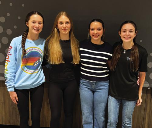 La Grange’s state qualifying 200 freestyle relay team of, left to right: Eleanor Carey, Paige Michalke, Celeine Fabre and Adysen Janacek.