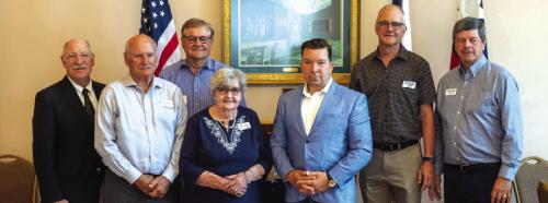 Czech Ambassador Miloslav Stašek poses for a photo with directors of the Texas Czech Heritage and Cultural Center: (from left) William H. Schovajsa, J. G. Hrncir, James Steffek, TCHCC President Retta Chandler, Ambassador Stašek, John Bartos and Walter Stoever.