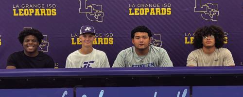 Four La Grange seniors signed letters of intent this week to play college sports and were honored at a Spring Signing Ceremony at La Grange High School. Left to right, those signees are Jaylances Johnson, Braxton Dahse, Javier Cuevas and Devonte McKenzie.